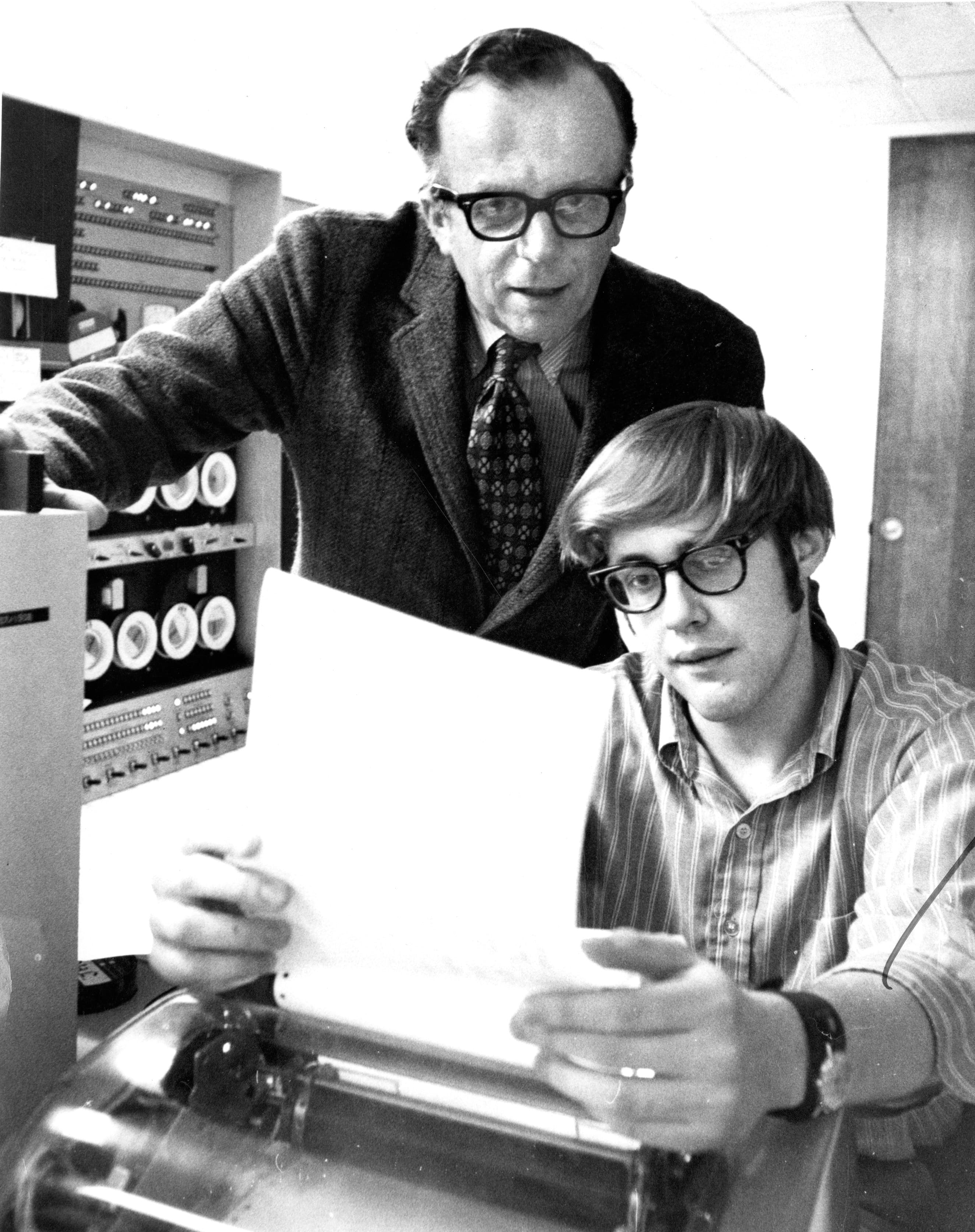 J.C.R. Licklider (top) and a student at MIT. Image from Philip Preston/The Boston Globe/Getty Images.